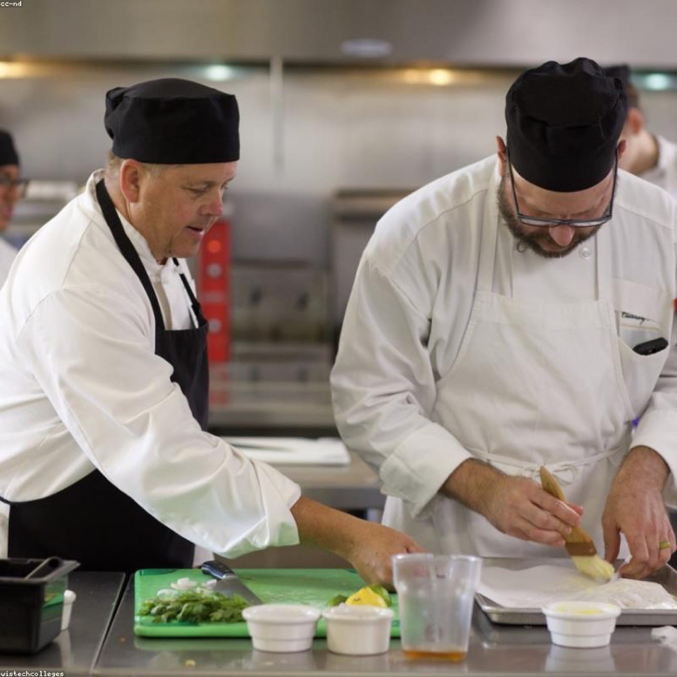Cloud Kitchens (Burger-Focused Brands) packing meals with disposable tableware